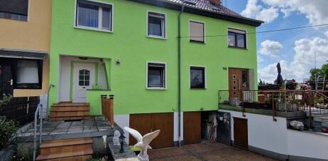 Reihenmittelhaus mit Terrasse, Garten und Garage